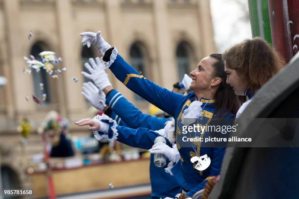 Carnival sailors throw sweets during the Rosenmontag carnival procession in Mainz, Germany, 12 Febraury 2018. The 'Rosenmontagsumzug' is the...