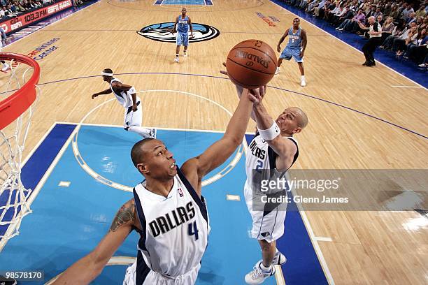 Caron Butler and Jason Kidd of the Dallas Mavericks go up for the rebound against the Denver Nuggets during the game at American Airlines Center on...