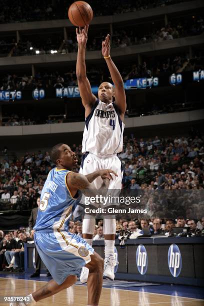 Caron Butler of the Dallas Mavericks shoots a jump shot against J.R. Smith of the Denver Nuggets during the game at American Airlines Center on March...