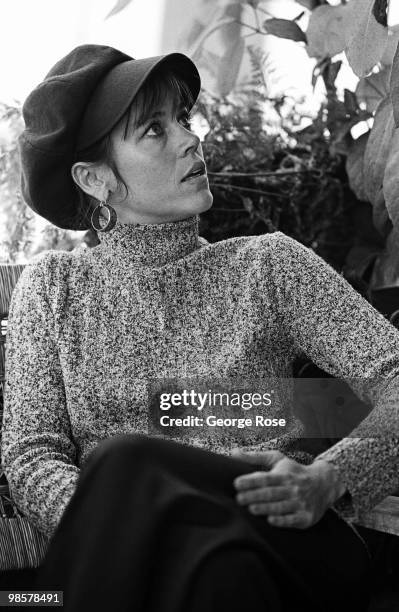 Academy Award-winning actress Jane Fonda talks with a reporter on the veranda of her home in this 1975 Santa Monica, California, photo portrait...