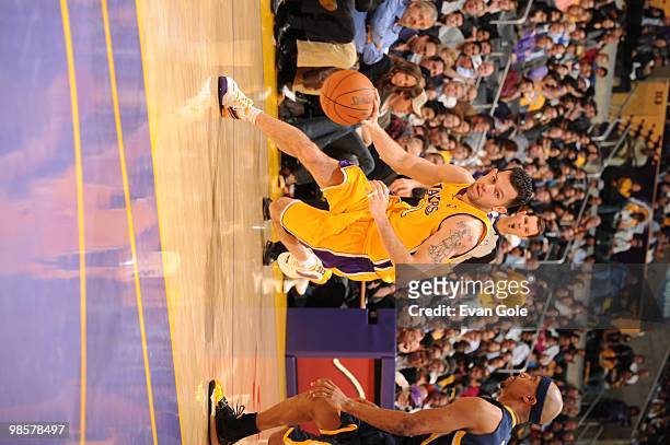 Jordan Farmar of the Los Angeles Lakers dribble drives to the basket against the Indiana Pacers during the game on March 2, 2010 at Staples Center in...