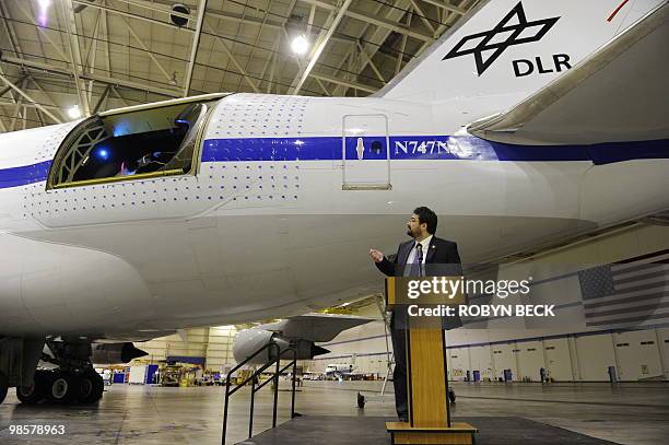 German telescope engineer Thomas Keilig, of the German Aerospace Center speaks below the telescope bay of the Stratospheric Observatory for Infrared...