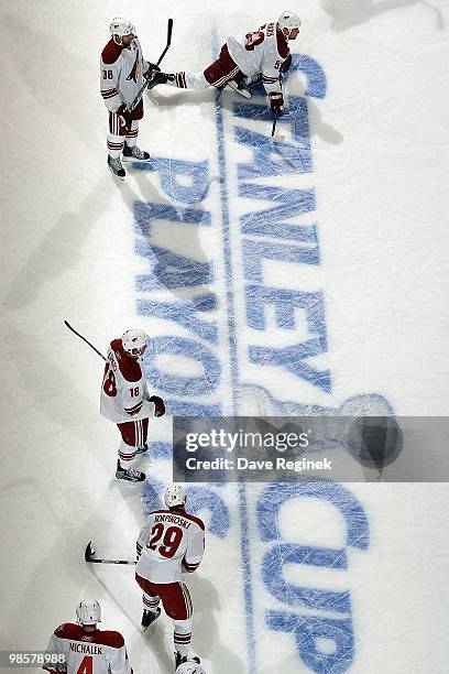 Players of the Phoenix Coyotes warm up on the ice before Game Four of the Eastern Conference Quarterfinals of the 2010 NHL Stanley Cup Playoffs...