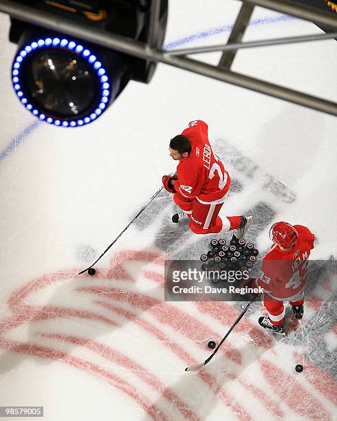 Brett Lebda and Darren Helm of the Detroit Red Wings warm up before Game Four of the Eastern Conference Quarterfinals of the 2010 NHL Stanley Cup...