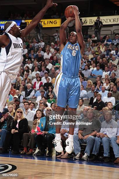 Arron Afflalo of the Denver Nuggets shoots a jump shot against the Dallas Mavericks during the game at American Airlines Center on March 29, 2010 in...