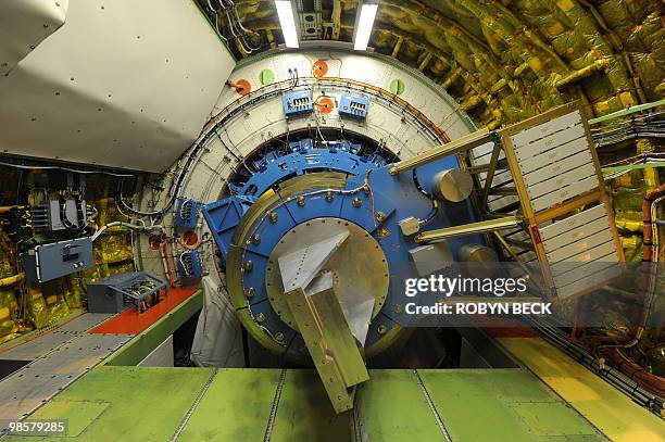 The telescope focal point and counterrweight are seen inside the of the Stratospheric Observatory for Infrared Astronomy , a cooperative venture...