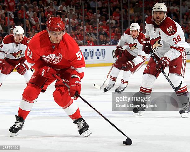 Valtteri Filppula of the Detroit Red Wings tries to keep the puck away from Vernon Fiddler of the Phoenix Coyotes during Game Four of the Eastern...