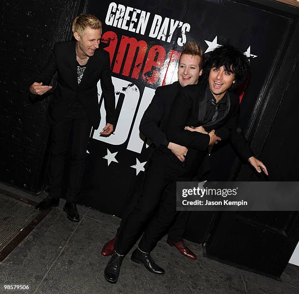 Musicians Mike Dirnt, Tre Cool and Billie Joe Armstrong of Green Day attend the Broadway Opening of "American Idiot" at the St. James Theatre on...