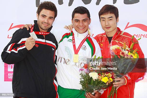 Alexandre Despatie, Yahel Castillo and Kai Qin receive their medals of the men's 3 meter competition during the FINA Diving World Series 2010 at...