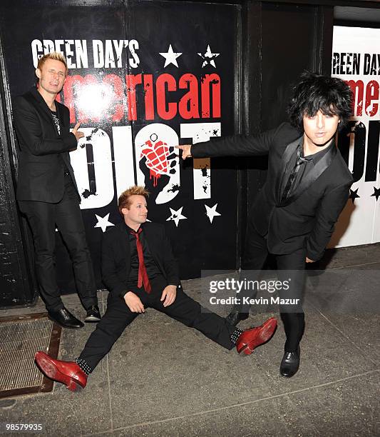 Mike Dirnt, Tre Cool and Billie Joe Armstrong of Green Day attend the opening of "American Idiot" on Broadway at the St. James Theatre on April 20,...