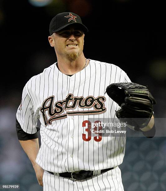 Pitcher Brett Meyers of the Houston Astros reacts after giving up a hit in the second inning against the Florida Marlins on April 20, 2010 in...