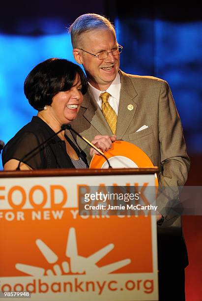 President and CEO of Food Bank for New York City Lucy Cabrera with honoree and Executive Director of St.John's Bread and Life Anthony Butler attend...