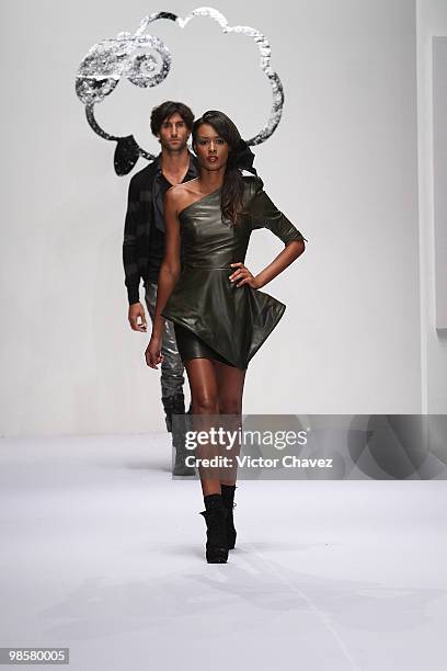 Model walks the runway wearing Ricardo Seco during Mercedes-Benz Fashion Mexico Autumn Winter 2010 at Campo Marte on April 16, 2010 in Mexico City,...