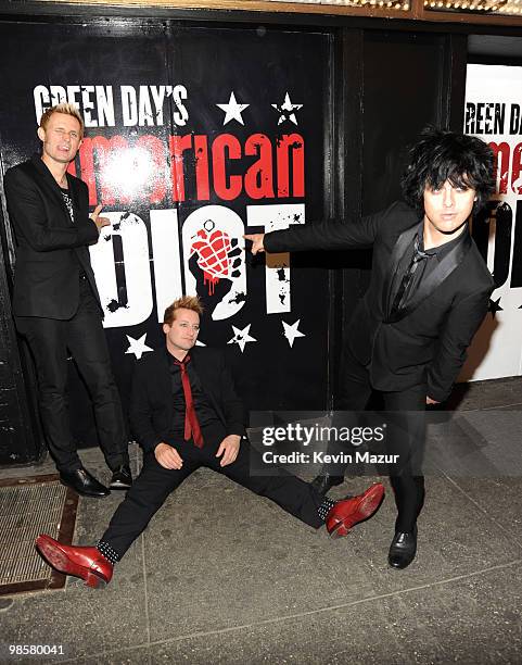 Mike Dirnt, Tre Cool and Billie Joe Armstrong of Green Day attend the opening of "American Idiot" on Broadway at the St. James Theatre on April 20,...