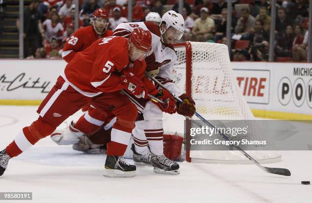 Wojtek Wolski of the Phoenix Coyotes tries to get to the puck in front of Nicklas Lidstrom of the Detroit Red Wings during Game Four of the Western...