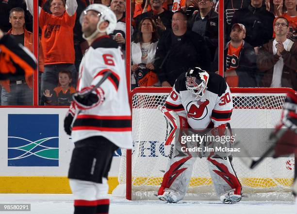 Martin Brodeur and Andy Greene of the New Jersey Devils look on after surrendering a goal in the third period against the Philadelphia Flyers in Game...