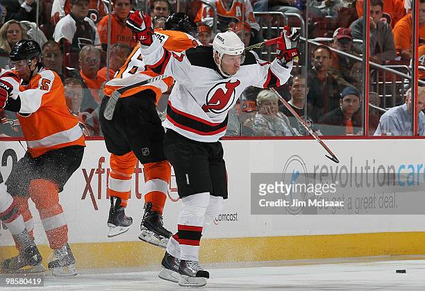 Ilya Kovalchuk of the New Jersey Devils avoids a check from Mike Richards of the Philadelphia Flyers in Game Four of the Eastern Conference...