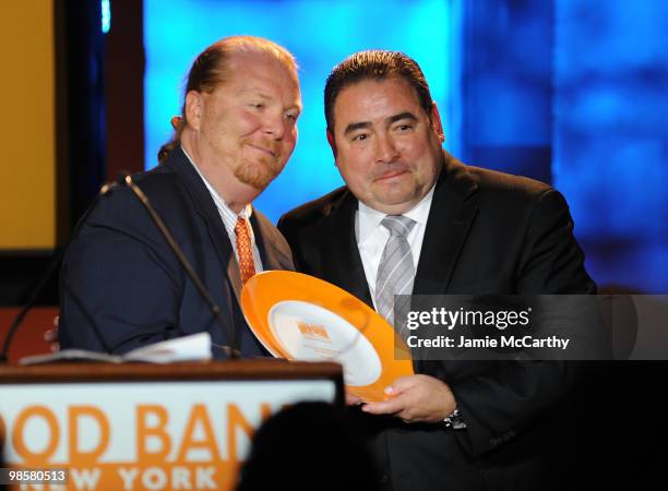 Chef Mario Batali and honoree Emeril Lagasse onstage the Food Bank for New York City's 8th Annual Can-Do Awards dinner at Abigail Kirsch�s Pier Sixty...