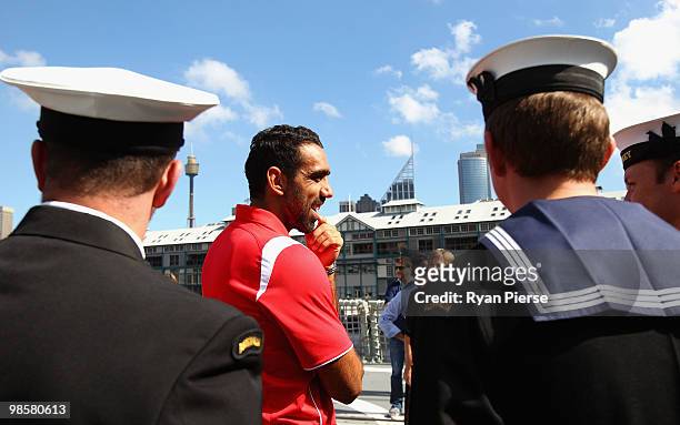 Adam Goodes of the Swans speaks with crew members aboard HMAS Sydney during a Sydney Swans AFL Press Conference at HMAS Kuttabul on April 21, 2010 in...