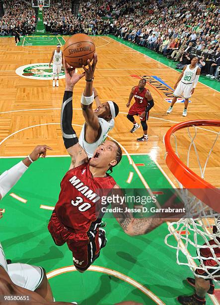Michael Beasley of the Miami Heat rebounds against Paul Pierce of the Boston Celtics in Game Two of the Eastern Conference Quarterfinals during the...
