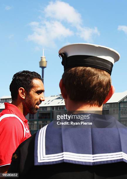 Adam Goodes of the Swans speaks with crew members aboard HMAS Sydney during a Sydney Swans AFL Press Conference at HMAS Kuttabul on April 21, 2010 in...
