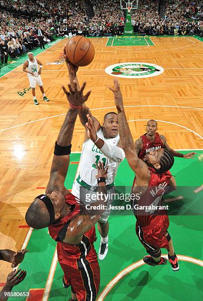 Glen Davis of the Boston Celtics shoots against Jermaine O'Neal and Udonis Haslem of the Miami Heat in Game Two of the Eastern Conference...