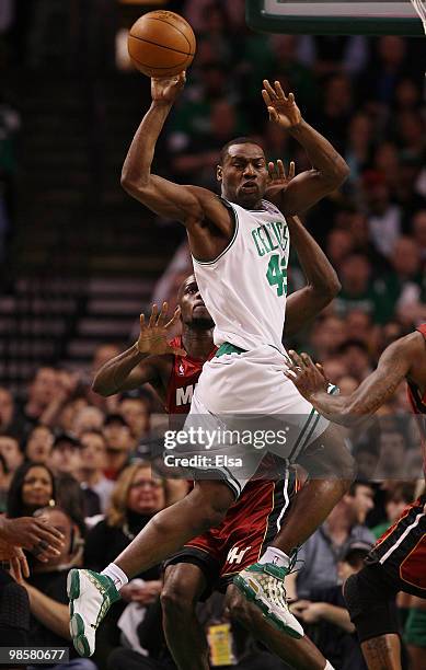 Tony Allen of the Boston Celtics passes the ball as Joel Anthony of the Miami Heat defends during Game Two of the Eastern Conference Quarterfinals of...