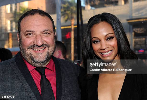 Producer Joel Silver and actress Zoe Saldana arrive at Warner Bros. "The Losers" premiere at Grauman's Chinese Theatre on April 20, 2010 in Los...