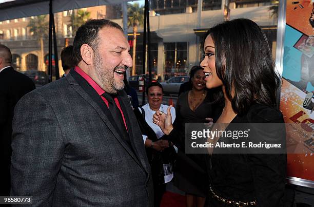 Producer Joel Silver and actress Zoe Saldana arrive at Warner Bros. "The Losers" premiere at Grauman's Chinese Theatre on April 20, 2010 in Los...