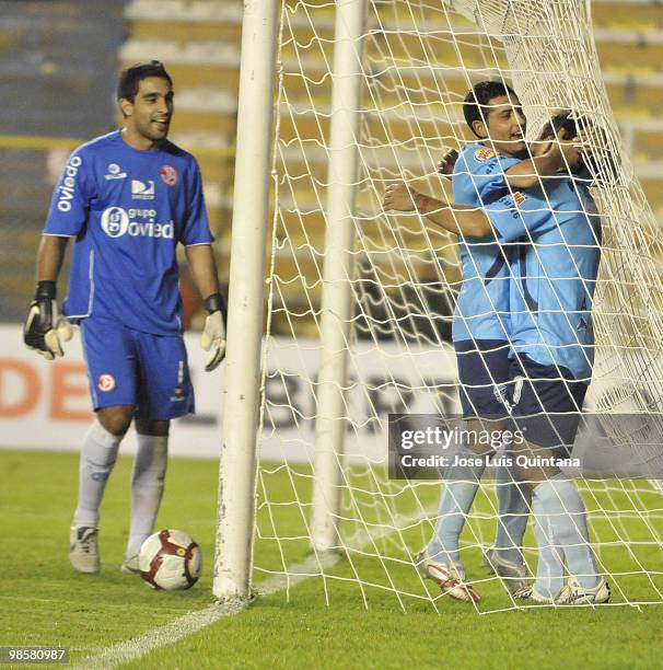 Bolivar's players Wilians Ferreira and Alex Da Rosa celebrate a scored goal during their match against Juan Aurich as part of 2010 Libertadores Cup...
