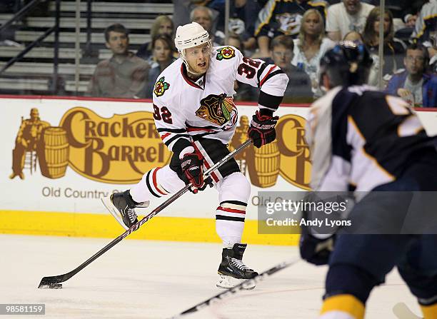 Kris Versteeg of the Chicago Blackhawks celebrates attempts a shot against the Nashville Predators during game 3 of the Western Conference...