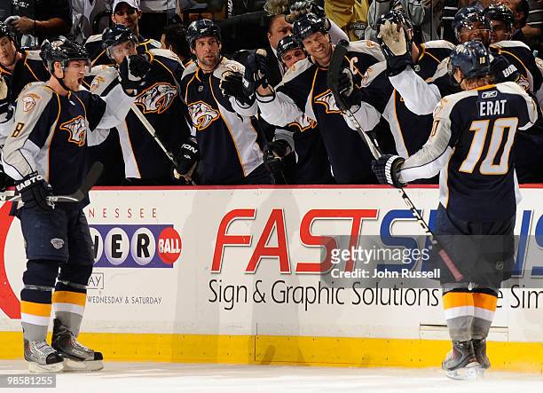 Martin Erat of the Nashville Predators is congratulated by his teammates after scoring a penalty shot goal against the Chicago Blackhawks in Game...