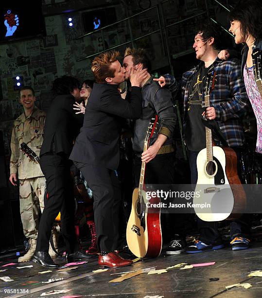 Musicians Billie Joe Armstrong and Tre Cool of Green Day attend the curtain call at the Broadway opening of "American Idiot" at the St. James Theatre...