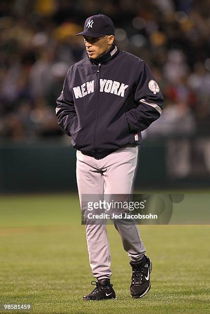 Manager Joe Girardi of the New York Yankees looks on against the Oakland Athletics during an MLB game at the Oakland-Alameda County Coliseum on April...