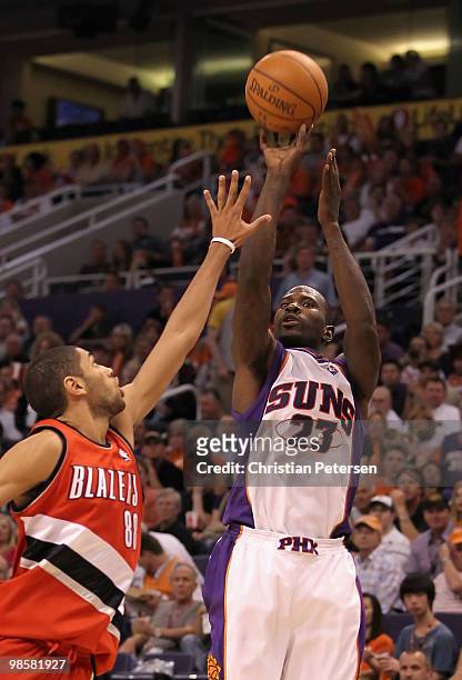 Jason Richardson of the Phoenix Suns puts up a shot over Nicolas Batum of the Portland Trail Blazers during Game Two of the Western Conference...