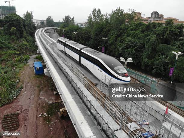 An 8.49-kilometer-long elevated railway track is under test on June 22, 2018 in Guang'an, Sichuan Province of China. The train with a highest speed...