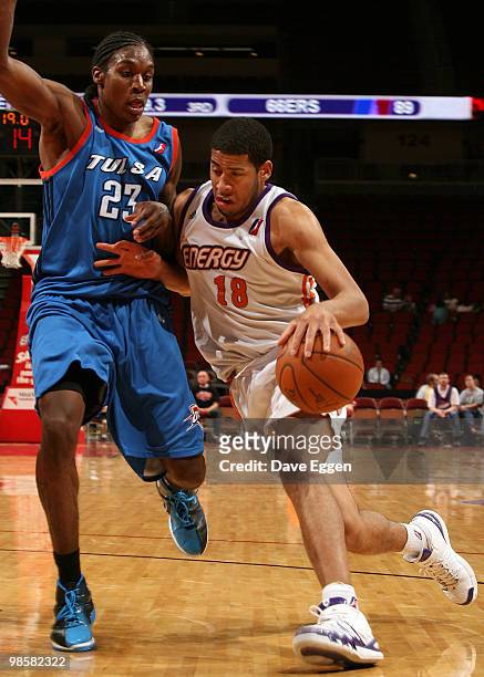 Mark Tyndale of the Iowa Energy drives against Larry Owens of the Tulsa 66ers in the second half of Game Three of their semi-final round series in...