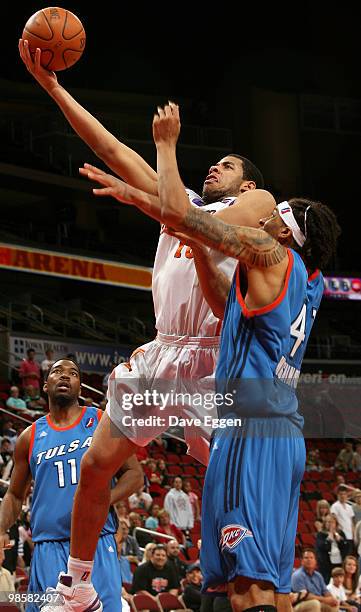 Mark Tyndale of the Iowa Energy drives against Deron Washington of the Tulsa 66ers in the second half of Game Three of their semi-final round series...