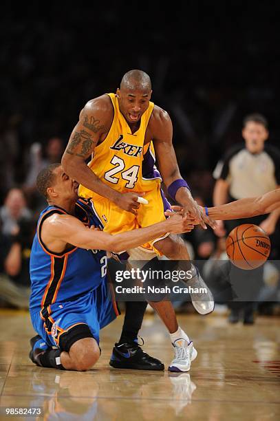 Kobe Bryant of the Los Angeles Lakers chases after a loose ball against Thabo Sefolosha of the Oklahoma City Thunder in Game Two of the Western...