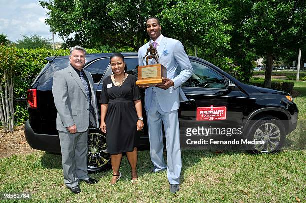 Brett Myers, District Sales Manager for Kia Motors America, Southern Region, Nap Ford Community School Executive Director Dr. Jennifer Porter-Smith...