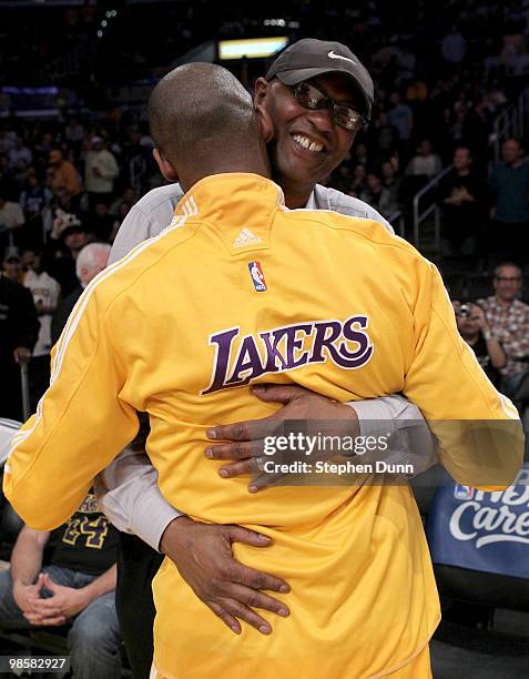 Kobe Bryant of the Los Angeles Lakers embraces his father Joe Jelly Bean Bryant before playing the Oklahoma City Thunder during Game Two of the...