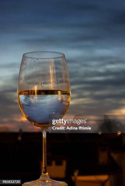 sunset in a glass - adina stock pictures, royalty-free photos & images