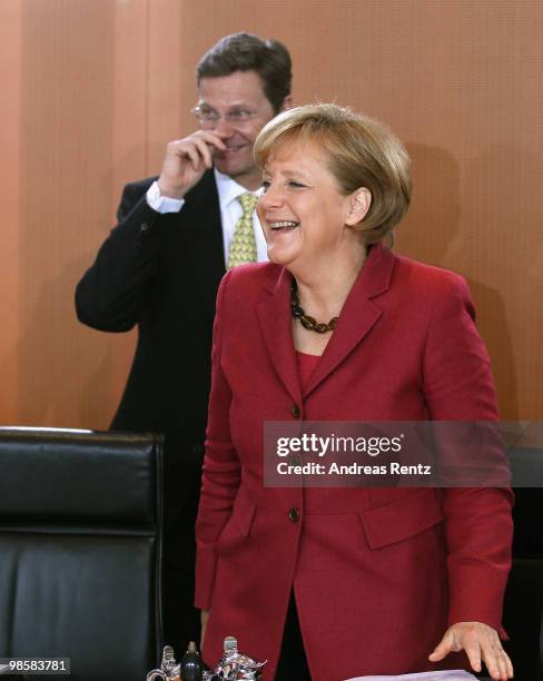 German Chancellor Angela Merkel and Vice Chancellor and German Foreign Minister Guido Westerwelle attend the weekly German government cabinet meeting...