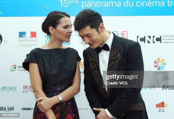 Actor Huang Xiaoming and French actress Virginie Ledoyen attend the 15th French Film Panorama on June 26, 2018 in Beijing, China.