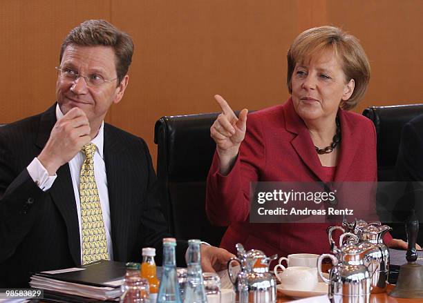 German Chancellor Angela Merkel and Vice Chancellor and German Foreign Minister Guido Westerwelle attend the weekly German government cabinet meeting...