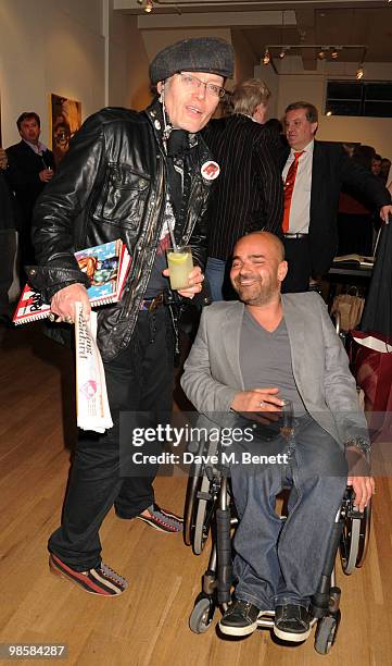 Adam Ant and Ash Atala attend the launch event for Triana De Lamo Terry's exhibition 'Soho Lights' at Gallery 27 on April 20, 2010 in London, England.