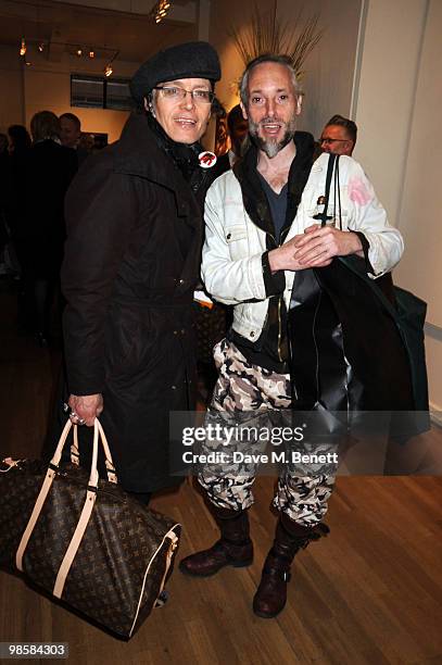 Adam Ant and Ben Westwood attend the launch event for Triana De Lamo Terry's exhibition 'Soho Lights' at Gallery 27 on April 20, 2010 in London,...