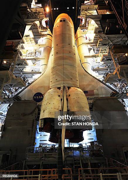 The space shuttle Atlantis stands ready in the Vehicle Assembly Building April 19, 2010 at Kennedy Space Center in Florida as NASA makes preparations...