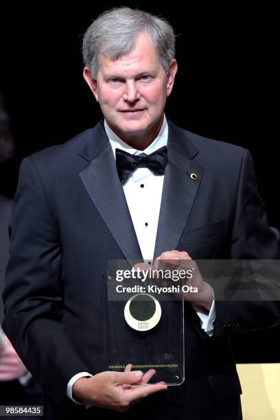 Japan Prize laureate Professor Peter Vitousek of the USA holds a prize medal during the Japan Prize presentation ceremony at the National Theatre of...