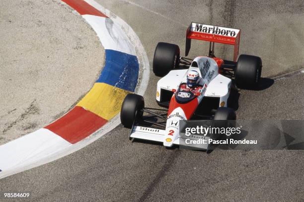 Alain Prost from France drives the Honda Marlboro McLaren McLaren MP4/5 Honda V10 during practice for the French Grand Prix on 8th July 1989 at the...